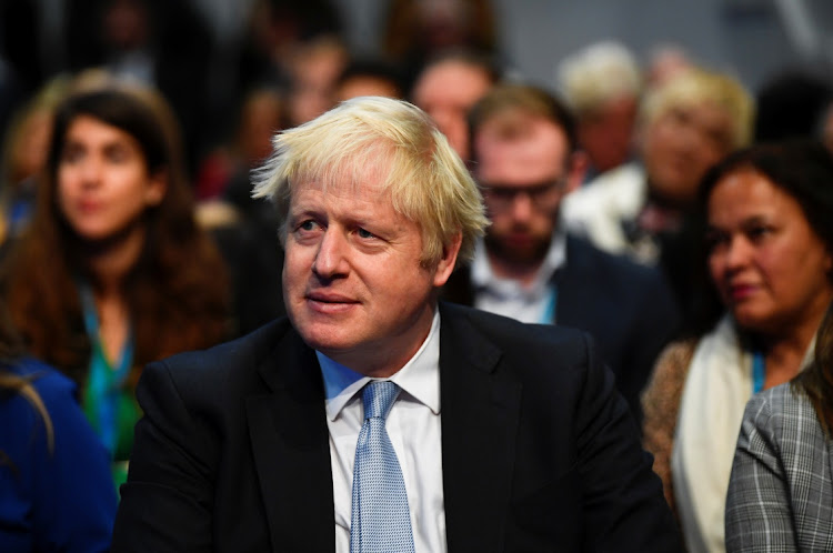 Prime Minister Boris Johnson looks on from the conference floor during the annual Conservative Party conference, in Manchester, Britain, October 4 2021. Picture: REUTERS/TOBY MELVILLE