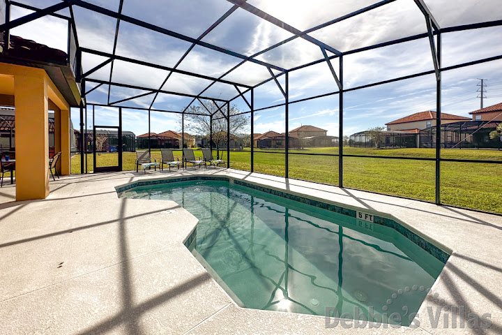 Sunny southwest-facing pool deck with no overlooking neighbours at this Providence vacation villa