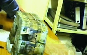 Dramatic footage of cash being counted in the vault of Bosasa was shown at the state capture inquiry in Parktown on January 17 2019. Bosasa's taxman Peet Venter testified on Wednesday that he was instructed to make illegal payments during his tenure at the company.