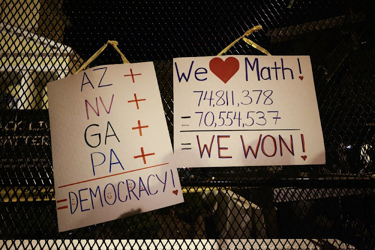 A sign claiming some of the states won by President-elect Joe Biden, is seen at BLM Plaza in Washington, DC, US, on November 7, 2020.