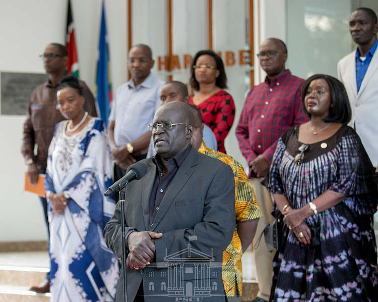 Education CS George Magoha speaks to the nation outside Harambee House on March 15, 2020.