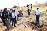 Acting KZN premier Nomagugu Simelane, transport MEC Sipho Hlomuka and acting education MEC Bongi Sithole-Moloi inspect the accident scene.