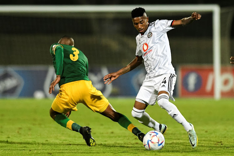 Monnapule Saleng of Orlando Pirates and Divine Lunga of Golden Arrows FC during the DStv Premiership match at Princess Magogo Stadium on October 18 2022.