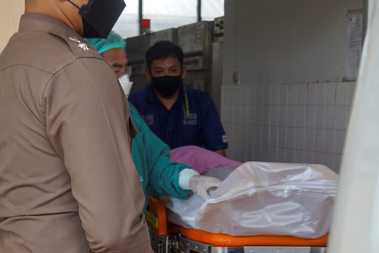 The body of Australian cricket player Shane Warne is transported at Samui hospital in Koh Samui on March 6, 2022.