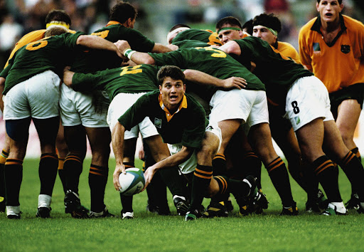 Springbok scrumhalf Joost Van Der Westhuizen passes the ball during the opening World Cup match against Australia at Newlands, Cape Town. South Africa won 27-18