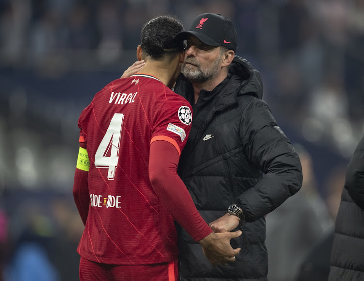 Liverpool manager Jurgen Klopp consoles Virgil van Dijk after the Uefa Champions League final against Real Madrid at Stade de France in Paris in May 2022.