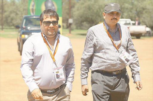 Brothers Ajay and Rajesh Gupta arrive in Bloemfontein as VIP guests at the ANC conference. Picure credit: KEVIN SUTHERLAND.