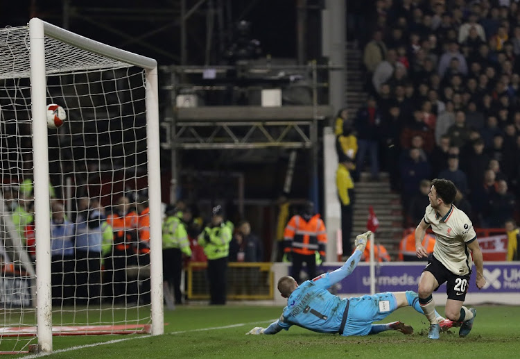 Diogo Jota scores for Liverpool in their FA Cup quarterfinal against Nottingham Forest at City Ground in Nottingham, England on March 20 2022.