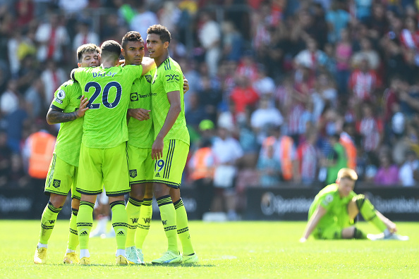 Manchester United players Lisandro Martinez, Diogo Dalot, Casemiro and Raphael Varane celebrate during their Premier League match against Southampton at Friends Provident St. Mary's Stadium on August 27, 2022 in Southampton, England.