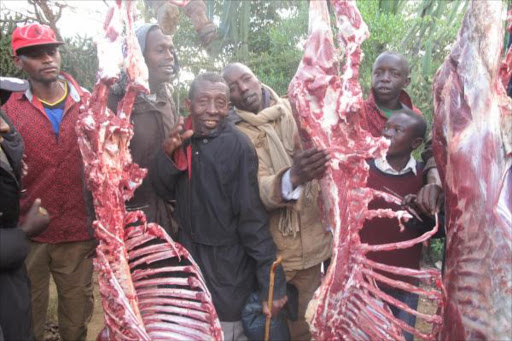 Members of the public view the carcasses of some of the 16 donkeys that were found slaughtered in Kiambogo village in Mai Mahiu, Naivasha, February 29, 2016. Photo/GEORGE MURAGE