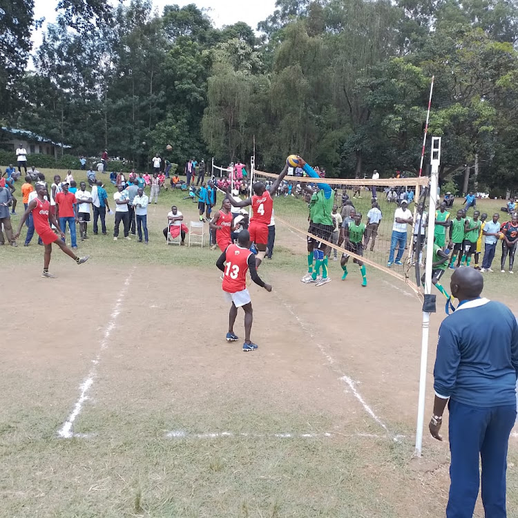 Namwela Boys (in red) during their match against Indangalasia during the Western Region Volleyball finals at St Peter's Mumias. They finished second at the national championships to book for East Africa School Games