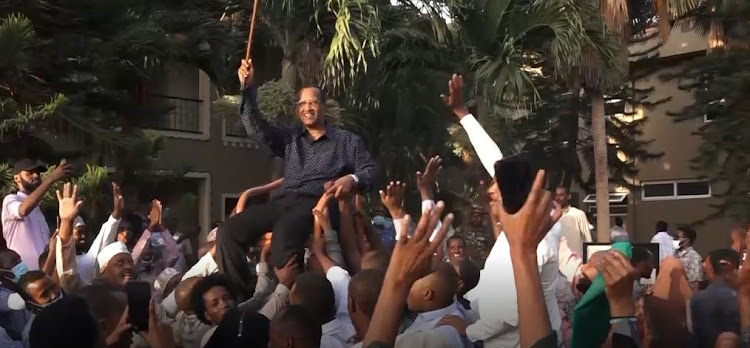 Former Garissa governor Nathif Jama is lifted high by his community members after he was endorsed by the elders as their sole candidate for the governor seat after Mohamed Shidiye stepped down in his favor.