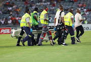 Makhehleni Makhaula of Orlando Pirates collapses during the Nedbank Cup, Last 16 match between Orlando Pirates and Hungry Lions at Orlando Stadium in Soweto.