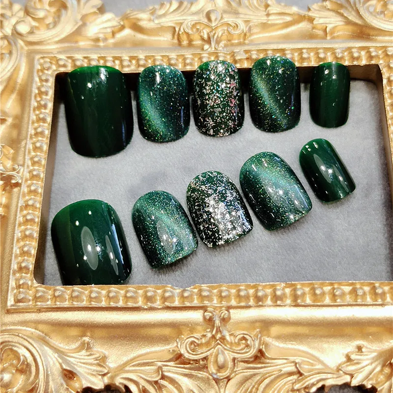 Unhas postiças destacáveis com efeito olho de gato esmeralda e diamantes cintilantes para unhas perfeitas em minutos.