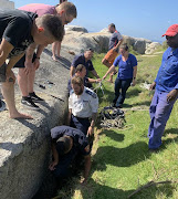 A dog trapped under a huge boulder in Simon's Town had to be rescued on Wednesday, April 10 2019.