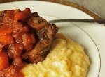 Saffron and Tomato-Braised Beef Short Ribs was pinched from <a href="http://www.purewow.com/ecs/4897.htm?sid=675422" target="_blank">www.purewow.com.</a>