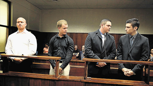 DOCK OF THE BAY: Durban brothers Blayne and Kyle Shepard, Andries van der Merwe and Dustin van Wyk stand trial for the murder of former Royal Marine Brett Williams. They allegedly beat Williams to death after a Super 15 rugby match at Kings Park Stadium last year