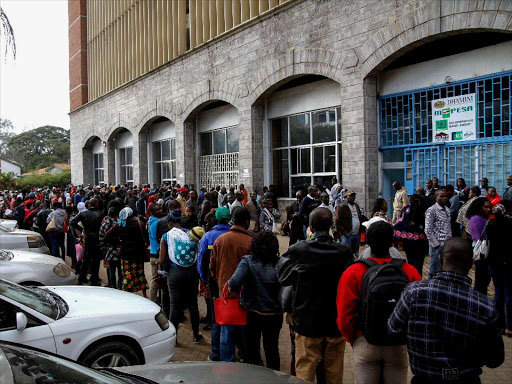 Nairobians queue at Bishop house in Nairobi upper hill to fill and pick Birth certificates on August 9,2018.The area has been experiencing long queues following the government decision to move the service from Huduma Center. Photo/Enos Teche.