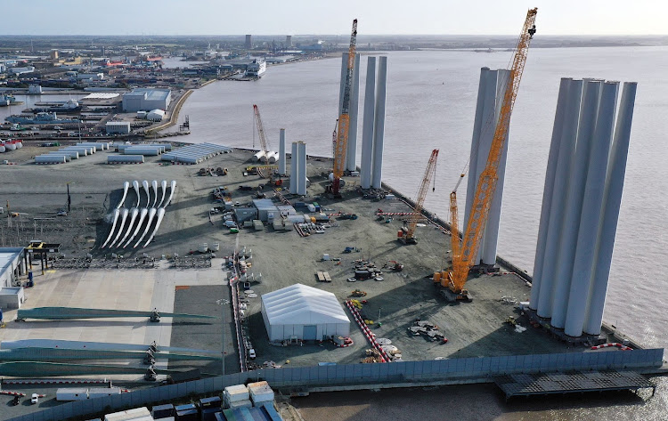 An aerial view of the Siemens Gamesa offshore blade factory on the banks of the River Humber in Hull, north east England on October 11, 2021. Siemens announced in August 2021 the plant is to be expanded by more than 41,000 square metres and remains largest offshore wind manufacturing facility in the UK.