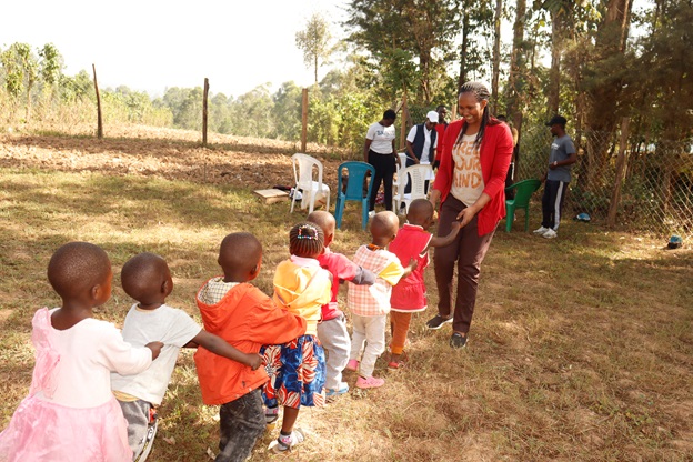 Edna Sabin conducts a motor skills assesment on children at one of their iHELP centers in Kakamega.