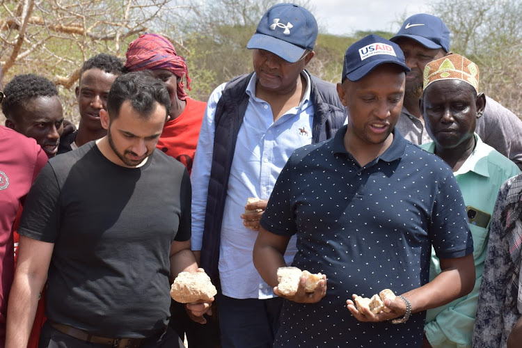 Isiolo Governor Abdi Ibrahim, Speaker Mohamed Roba and a team of geologists during a resource mapping trip at Malkadaka area in Isiolo County on November 29, 2022.