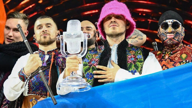 On stage with the trophy in Turin