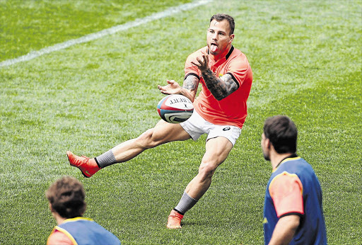 SERIOUS PLAY: Francois Hougaard during a Springbok training session at Cape Town Stadium. The scrumhalf's speed at the breakdown will be a crucial part of the Boks' strategy against the Wallabies tomorrow at Newlands