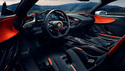 The motorsport-inspired two-seat cabin is trimmed in carbon fibre and alcantara. 