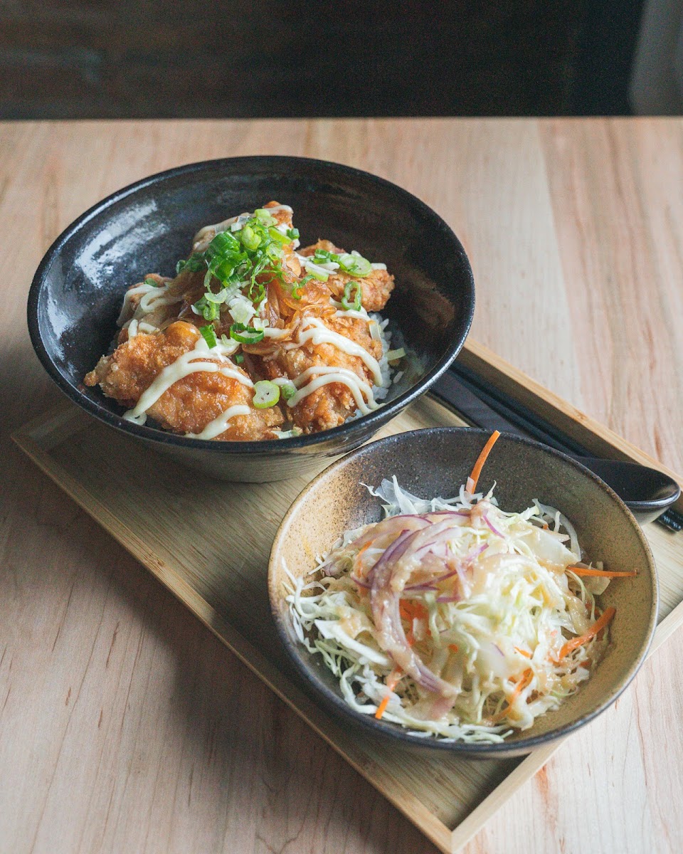 Karaage (Japanese Fried Chicken) on Rice, topped with house-made mayo, pickled onions and scallions. Comes with small salad. All made free of gluten.