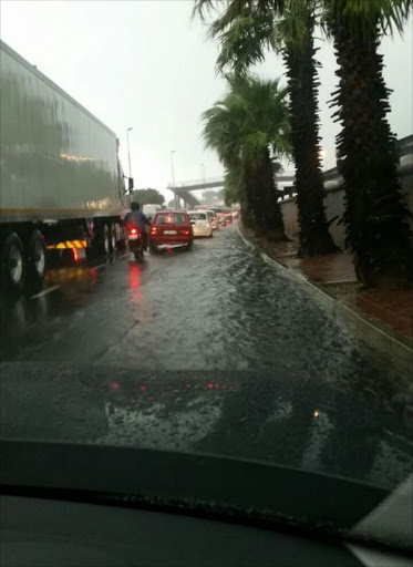 Cars make their way through traffic during a heavy storm on the N2 in Cape Town. Image: Lisa MacLeod