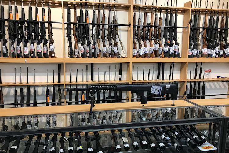 Firearms and accessories are displayed at Gun City gunshop in Christchurch, New Zealand.