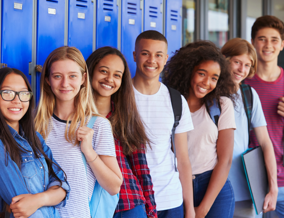 A group of people posing for a photo

Description automatically generated