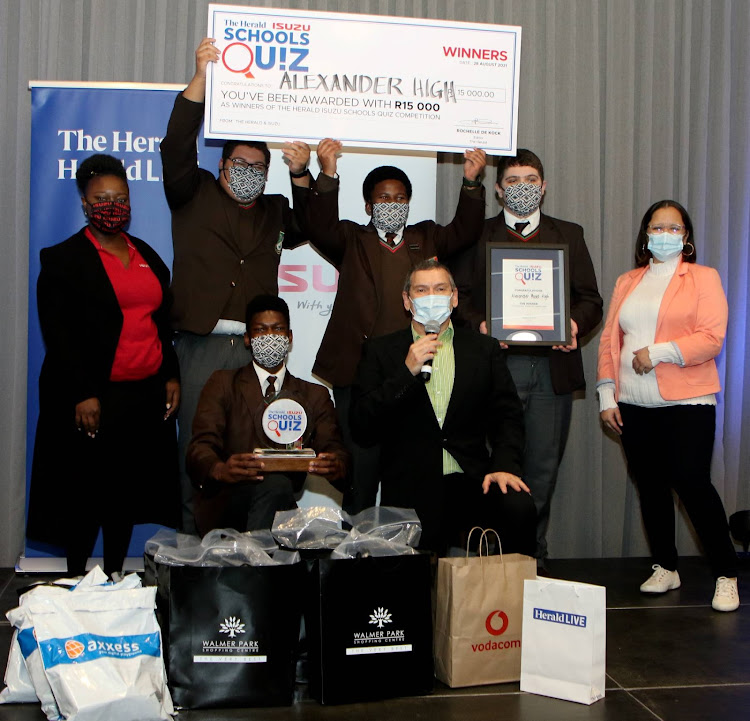 Alexander Road High School were the winners of The Herald Isuzu Schools Quiz Competition 2021. Pictured are, back from left: Isuzu corporate communications officer Iviwe Poti and Alexander Road High pupils Kieran White, Bayolise Vukuza, Reith Schultz and Isaac Ugue, kneeling, along with quiz master Ian von Memerty and The Herald editor Rochelle de Kock