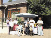 BENEFACTORS: Some of the children and parents who benefited from Mama Angel's donation. © Unknown.