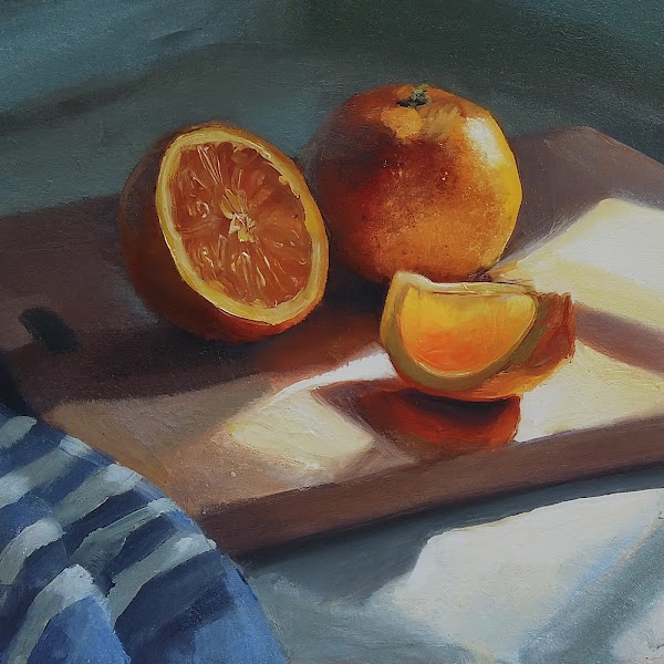 Small oil painting on canvas of an orange on a cutting board.  The light passes through the orange parts, casting orange light on part of the cutting board.  There is a blue and white cloth in the background.  Caustics, bouncing light, expressive brushstrokes