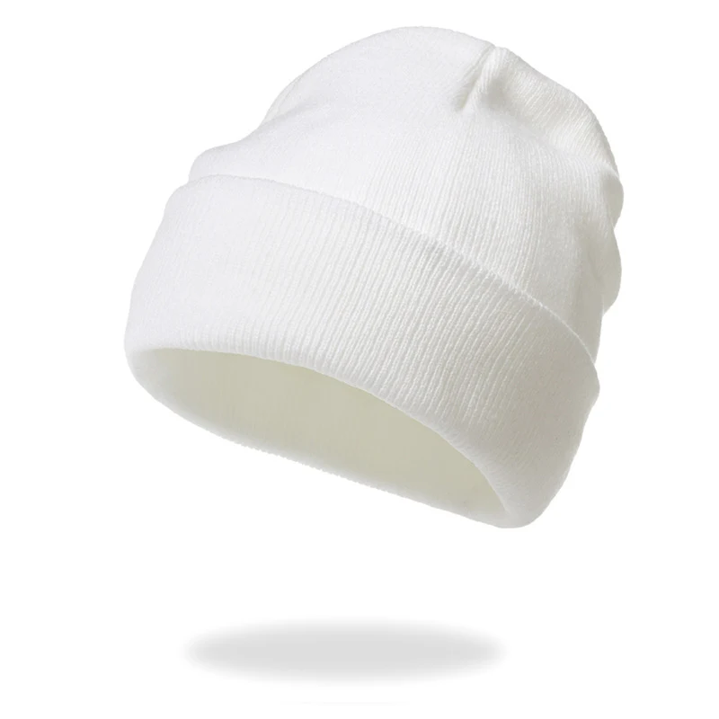 Bonnet en tricot de couleur unie pour femme, chaud et confortable, idéal pour l'hiver. Restez au chaud et avec style grâce à ce bonnet.