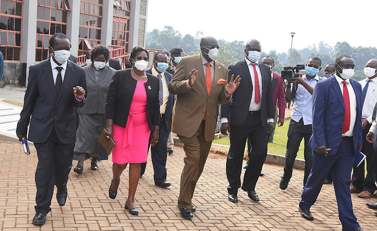 Education CS Prof. George Magoha (centre), MMUST acting VC Prof. Solomon Shibairo (far Left) with other university and ministry officials on Thursday
