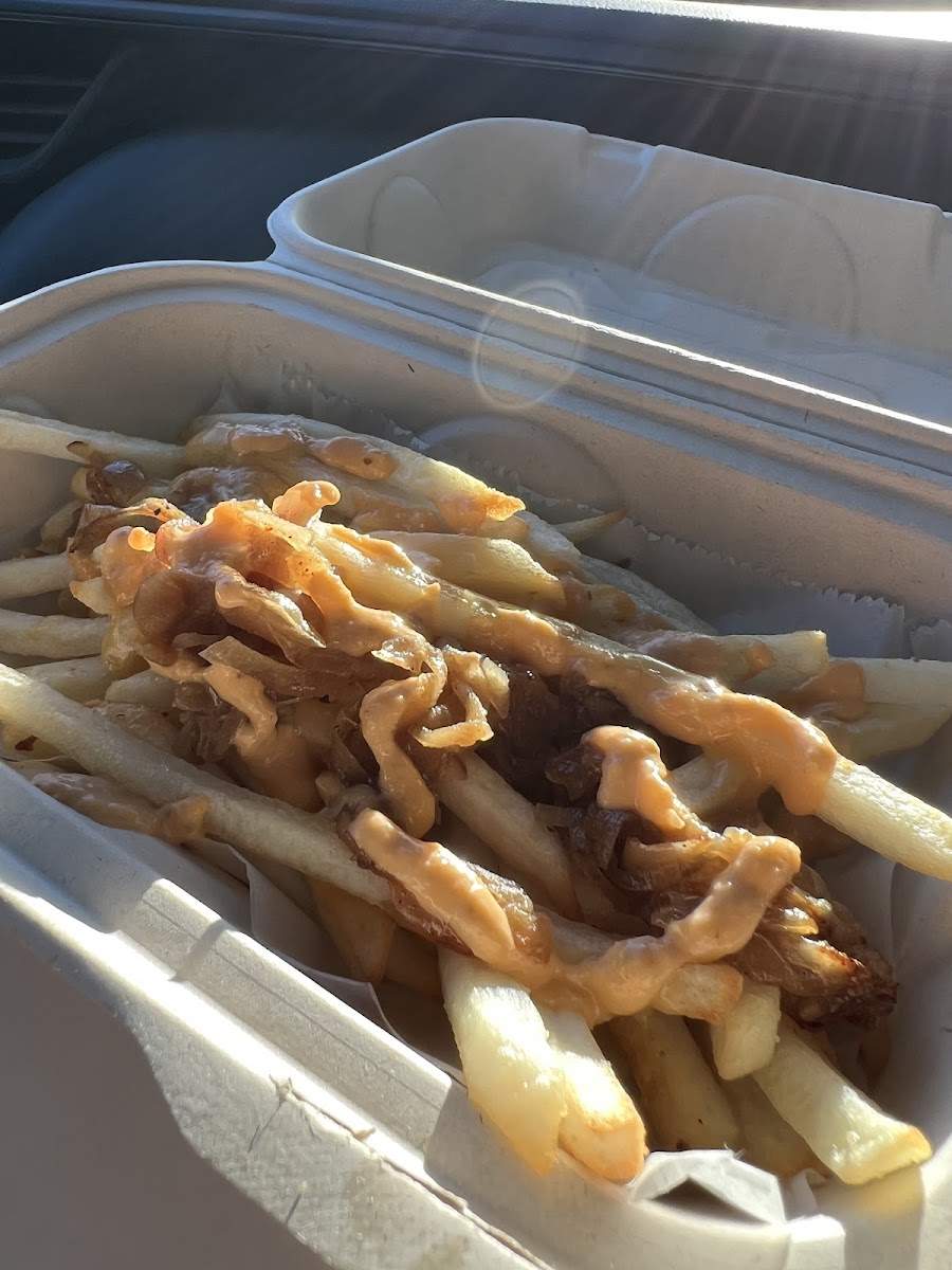 Air fried fries with caramalized onion and sauces