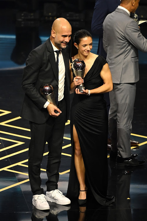 Fifa Men's Coach of the Year Pep Guardiola, and Fifa Best Women's Award winner Aitana Bonmati, react during the The Best FIFA Football Awards 2023 at The Apollo Theatre on January 15, 2024 in London, England.