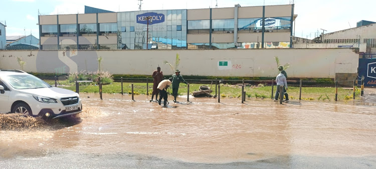 A flooded section of a road along LungaLunga, Industrial area following heavy rains that pounded the city last night. March 25, 2024