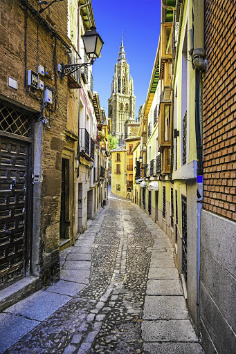 An alleyway in Toledo leads on to the cathedral.