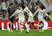 Real Madrid's Federico Valverde celebrates scoring their third goal with Ferland Mendy and Antonio Rudiger in their Uefa Champions League quarterfinal first leg against Manchester City at Santiago Bernabeu in Madrid on Tuesday night.