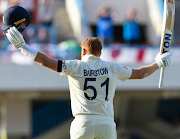 England batter Jonny Bairstow celebrates his century at the Sir Viv Richards Stadium in Antigua. 