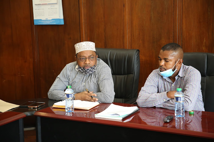 Mombasa county assembly clerk Salim Juma and deputy speaker Fadhili Makarani during the meeting with Westminster Foundation Democracy.