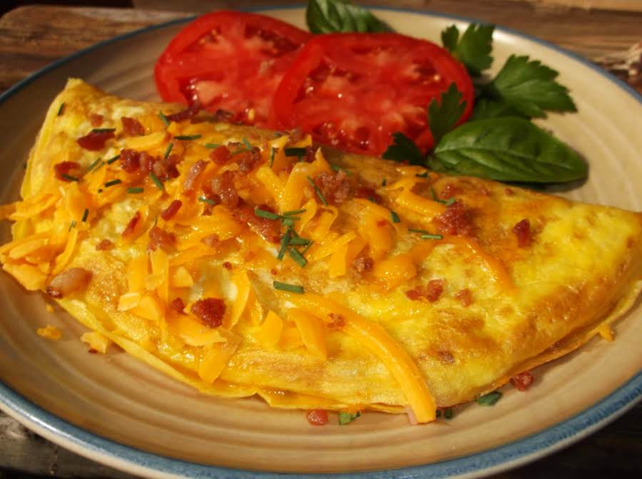 Bacon Cheddar Ham Omelette Recipe | Just A Pinch Recipes