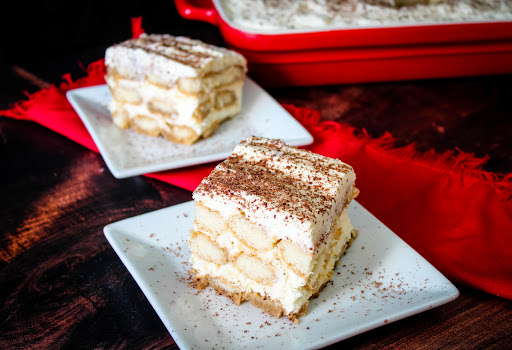 Slice of Tiramisu on a plate.