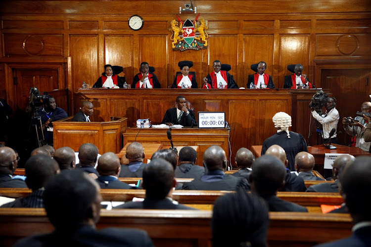 Kenya's Supreme Court judges attend a hearing regarding petitions challenging the result of the presidential election rerun at Kenya's Supreme Court in Nairobi, Kenya November 14, 2017.