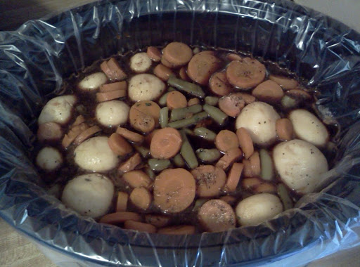 All ingredients placed in crock pot ready to cook. (before cooked) 