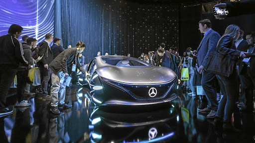 Attendees at the CES 2020 admire the Mercedes-Benz Vision AVTR.