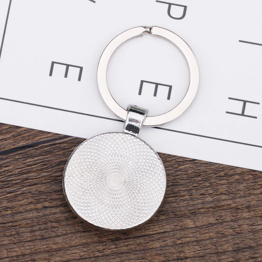 Hot Selling Paard Tijd Edelsteen Glazen Sleutelhanger, een glanzende accessoire voor paardenliefhebbers, perfect als cadeau of geluksbrenger.